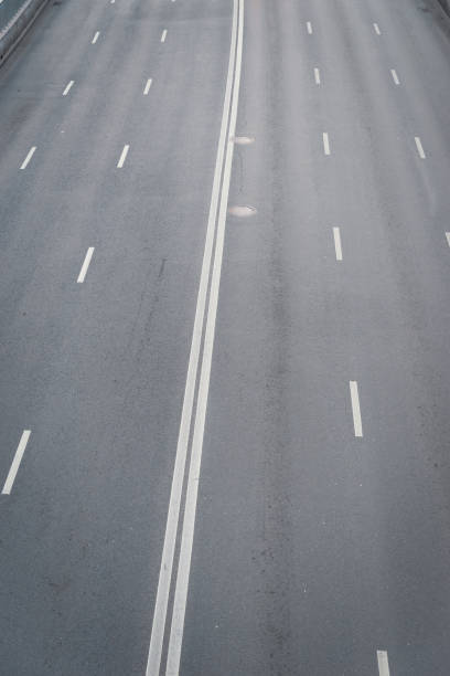 istock City road with no traffic 1179752685