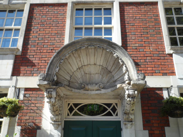 istock Carved Stone Clam Shell Canopy over Doorway 1179756060