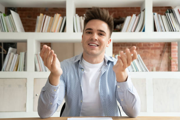 istock Young guy recording video for personal educational channel 1179756332