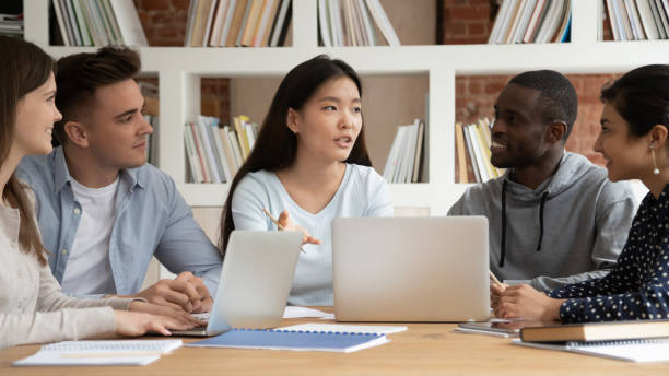istock Asian female team leader explaining new school research project details. 1179756431