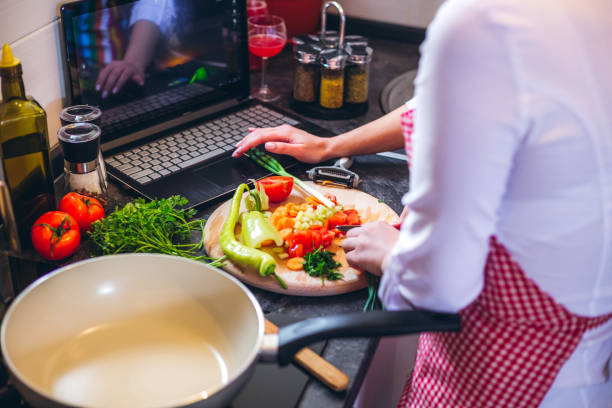 istock Young woman preparing a meal 1179757429