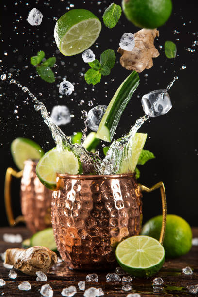 istock Famous splashing Moscow mule alcoholic cocktail in copper mugs. 1179758510