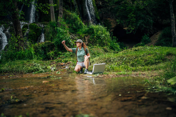 istock Biologist taking a water sample in nature 1179758569