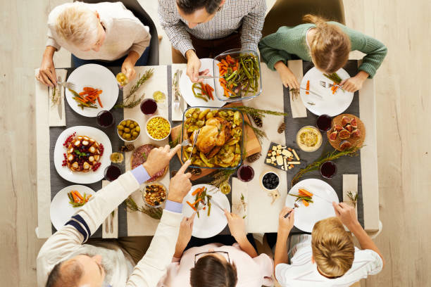 istock Family eating meat with vegetables 1179758696