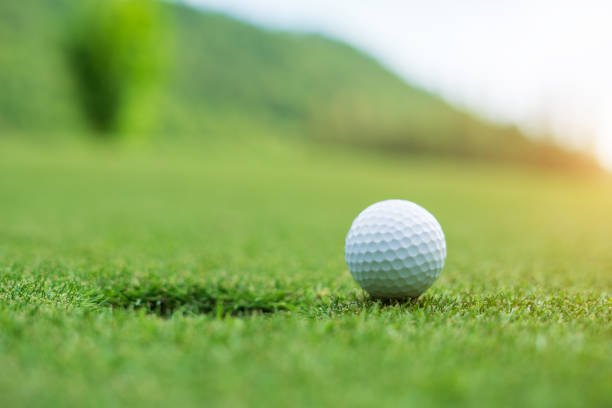 istock Golf ball on green grass ready to be struck at golf club 1179759523
