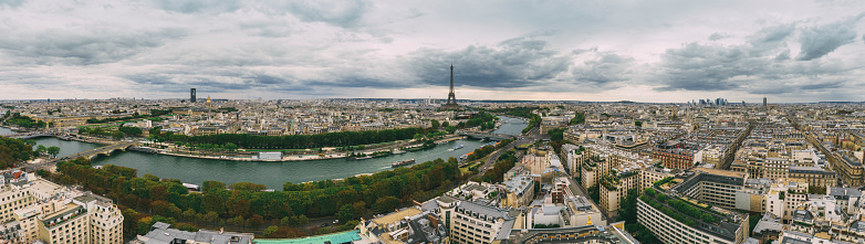 Sunset over Paris with Seine river with Eiffel Tower Aerial view