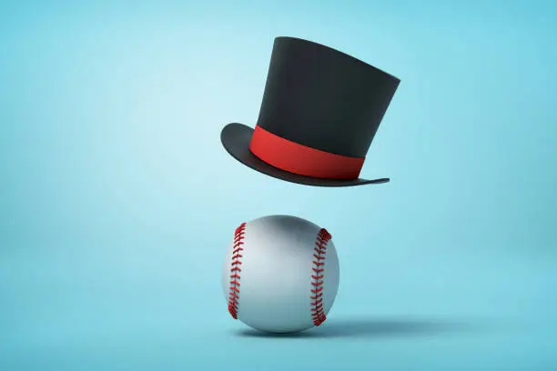 Photo of 3d rendering of a baseball and a black tophat floating in the air above the ball on light blue background.