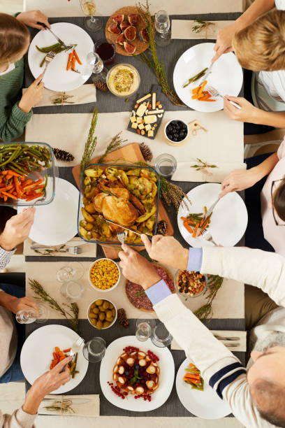 istock Family eating roast turkey 1179762949