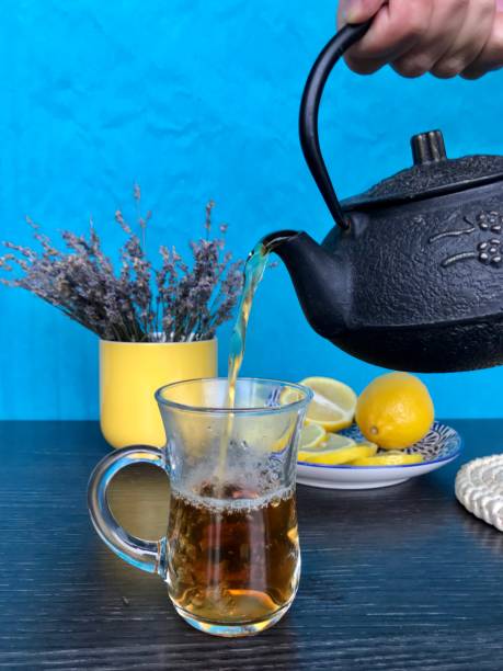 Cup Tea and kettle Hot tea and lemons 8571 stock pictures, royalty-free photos & images