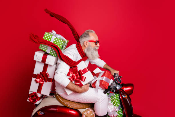 profile side view of his he nice funny funky gray-haired bearded man riding moto delivering stack desirable purchase air wind blow kerchief isolated over bright vivid shine red background - active seniors enjoyment driveway vitality imagens e fotografias de stock