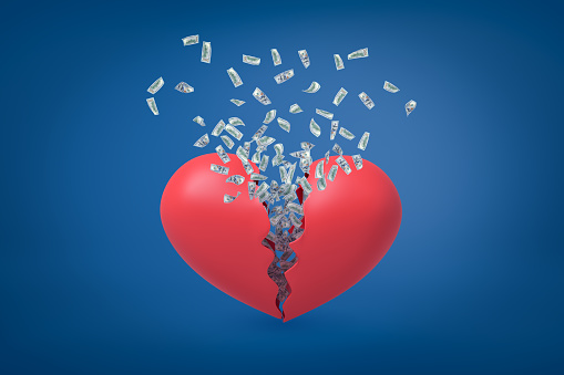 3d rendering of valentine heart broken in two with dollars flying out from inside. Love cannot be forced. Marriage of convenience. Love money more than people.