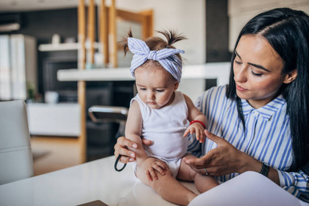 istock Young mom with cute baby 1179769125