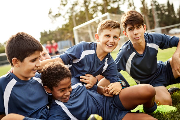 istock Soccer players celebrating success after match 1179770176