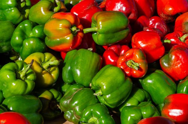 istock Green and red bell peppers 1179770832
