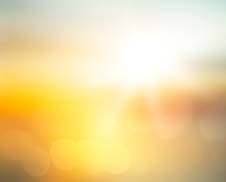 Abstract blurred yellow and orange sea sunrise background