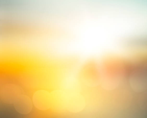 Summer holiday concept Abstract blurred yellow and orange sea sunrise background sunlight stock pictures, royalty-free photos & images