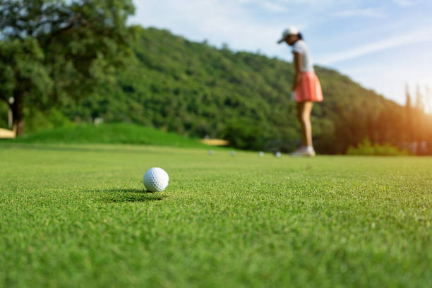 istock Woman driving practice golf or trainer at golf course 1179772345