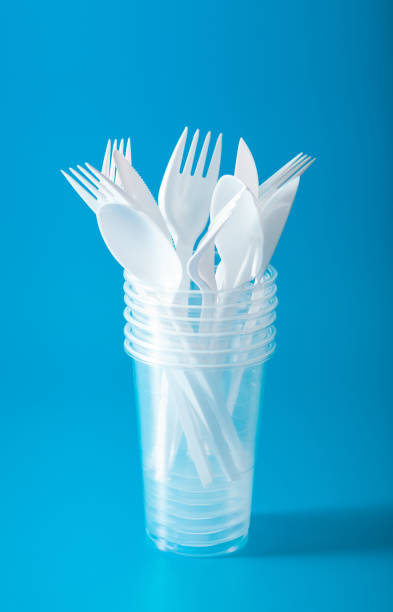 istock single use plastic cups, forks, spoons. concept of recycling plastic, plastic waste 1179773806