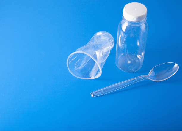 istock single use plastic bottles, cups, spoons. concept of recycling plastic, plastic waste 1179773992
