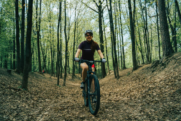 istock Women is riding on bicycle. 1179775486