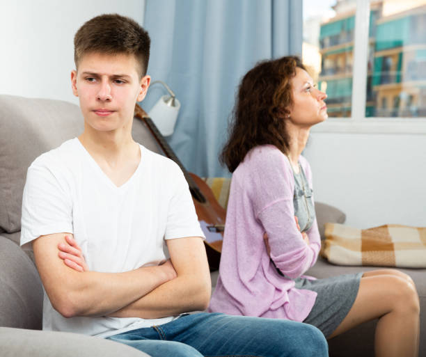 istock Offended mother and teenage son 1179776063