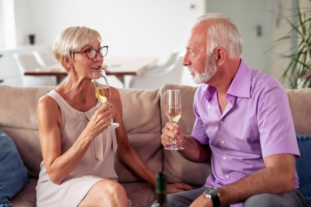 istock Senior couple enjoying at home 1179776643