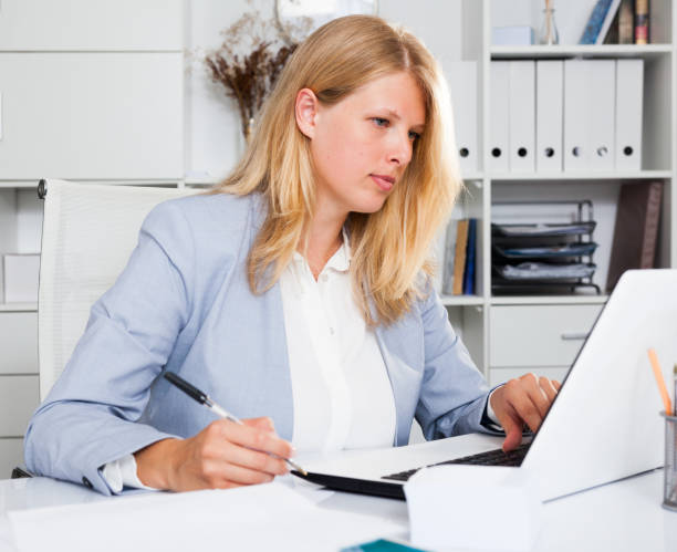 istock Lady business adviser working at office 1179777341
