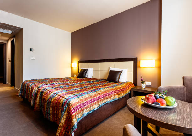 istock Luxury bedroom suite in hotel 1179778190