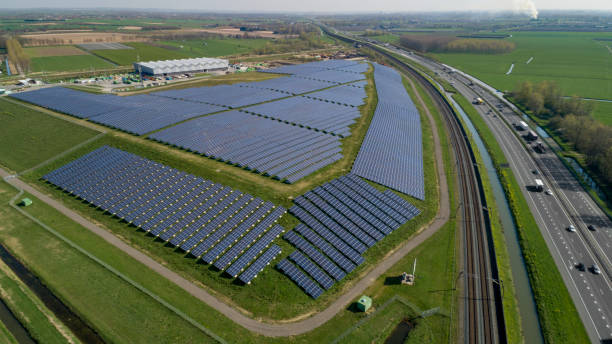 istock Solar panel farm with photovoltaic panels for clean solar energy 1179779038