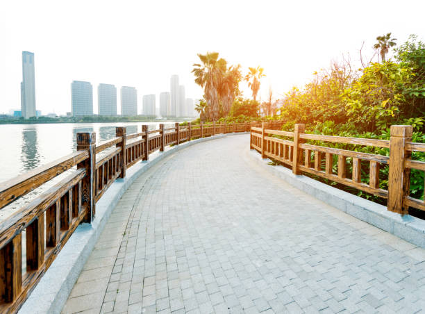 istock Bridge and skyscraper by the sea 1179779112
