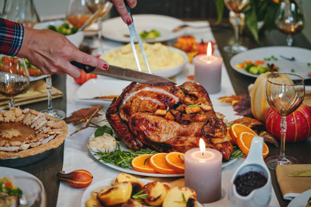 istock Family Having Traditional Holiday Stuffed Turkey Dinner 1179779422