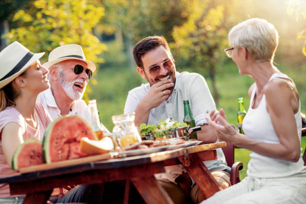 istock Happy family having picnic in park 1179779513