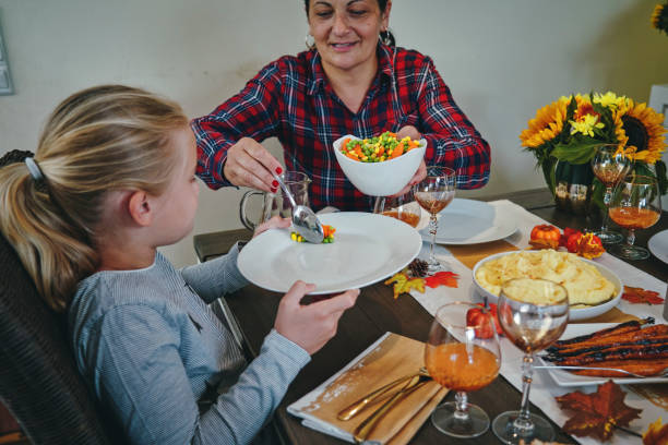 istock Family Having Traditional Holiday Stuffed Turkey Dinner 1179779537