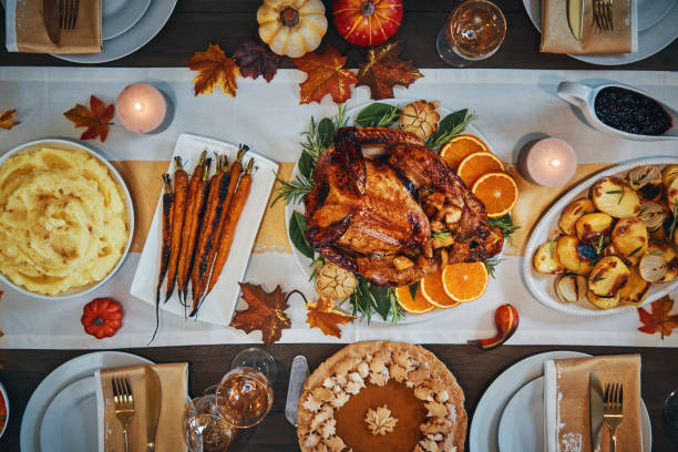 istock Family Having Traditional Holiday Stuffed Turkey Dinner 1179779539
