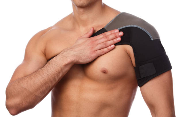istock Man with a support bandage on his shoulder 1179783289