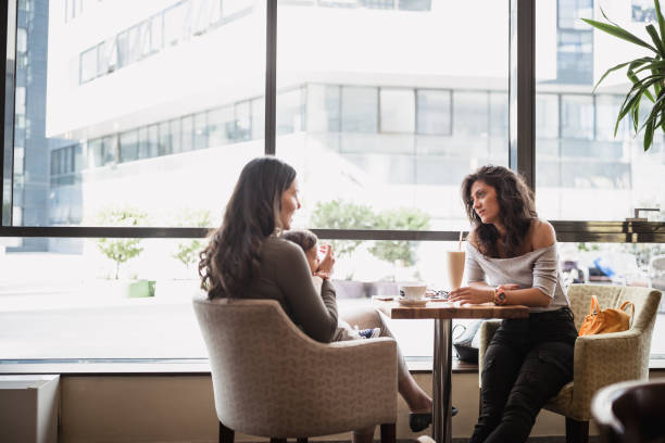istock On the coffee with mother and her girlfriend 1179784964