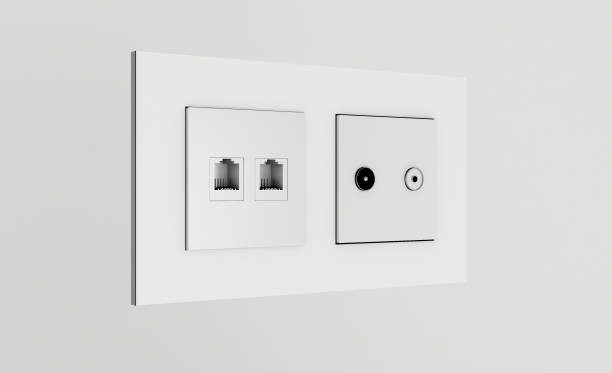 istock Multi socket wall outlet with electrical, ethernet, cable or satellite TV connections and light switch.. 3D rendering 1179790848