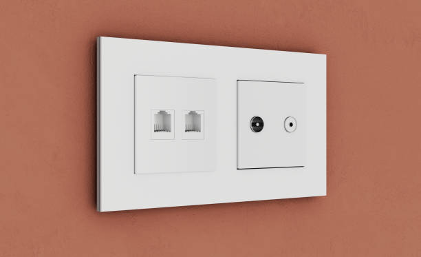 istock Multi socket wall outlet with electrical, ethernet, cable or satellite TV connections and light switch.. 3D rendering 1179790850