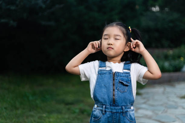 istock Cute girl meditating 1179792212