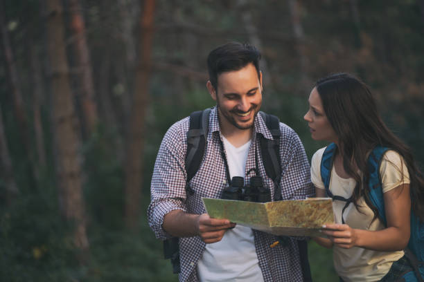 istock Couple hiking in nature 1179793350
