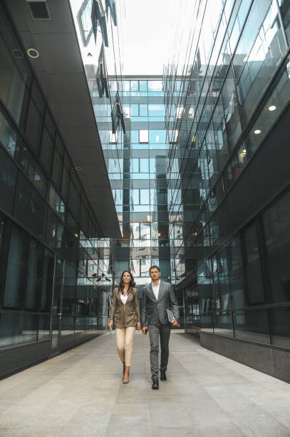 istock Colleagues in front of the office building 1179796249