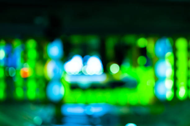 istock Green abstract bokeh night in city background. 1179797647