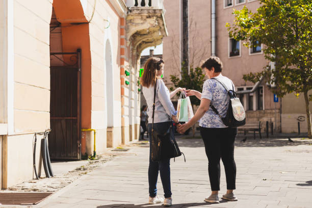 istock Mother and daughter shopping 1179799253