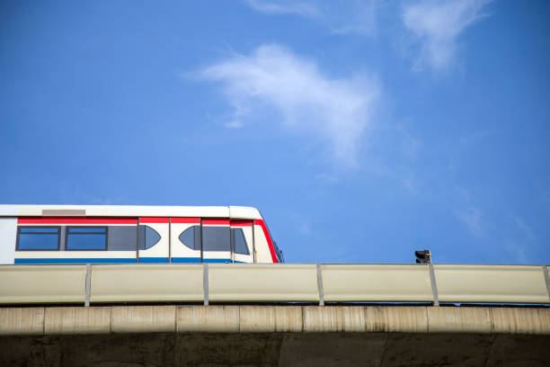 istock Sky train parked on rail way nearly traffic light pole. 1179799445