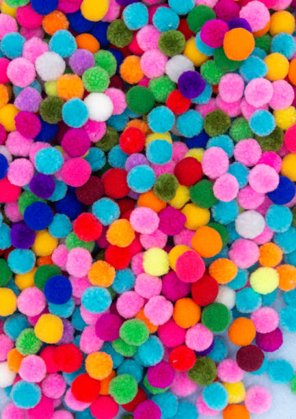 istock A colorful  Pom Pom background 1179800194