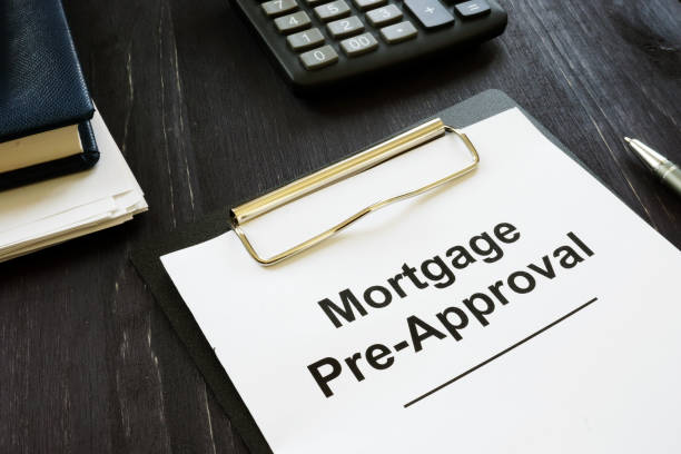 istock Business photo shows printed text Mortgage Pre-Approval 1179800424