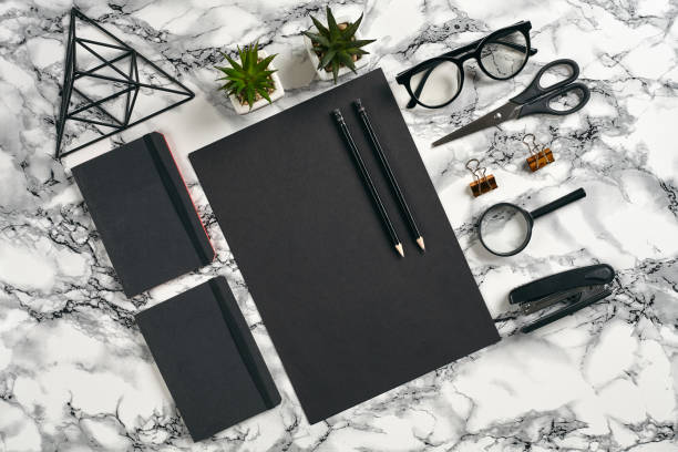 istock Top view in focus with different office equipment, supplies, stationery. Marble table with copy space. Education, workplace background. Close-up 1179803207