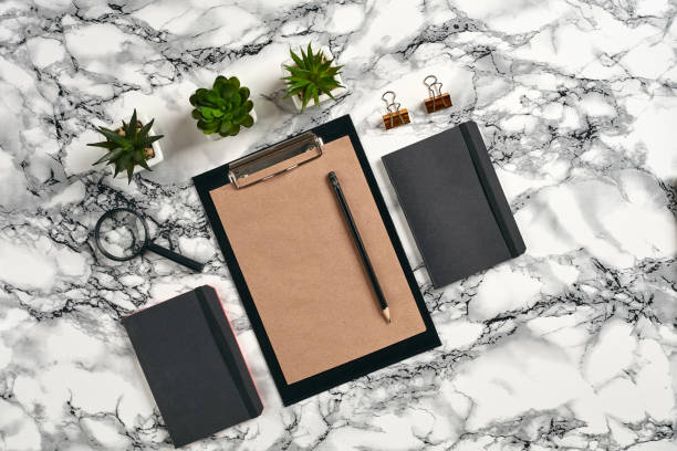 istock Top view in focus with different office equipment, supplies, stationery. Marble table with copy space. Education, workplace background. Close-up 1179806176