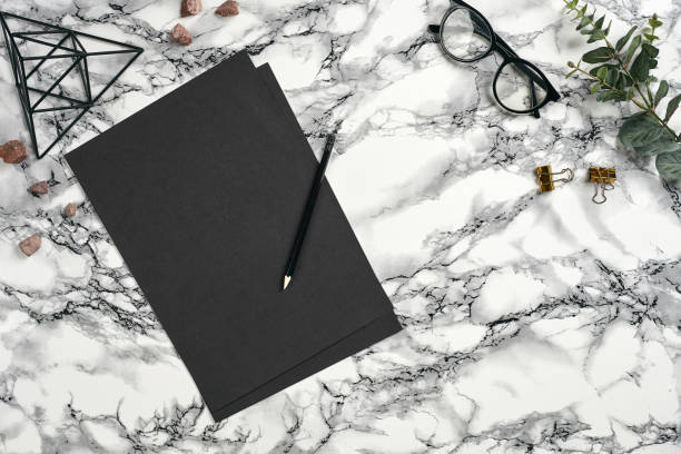 istock Top view in focus with different office equipment, supplies, stationery. Marble table with copy space. Education, workplace background. Close-up 1179807991