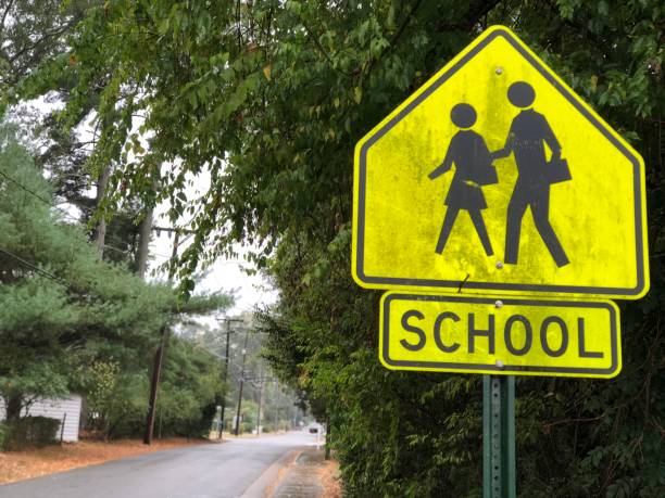 istock School crossing road sign 1179808026